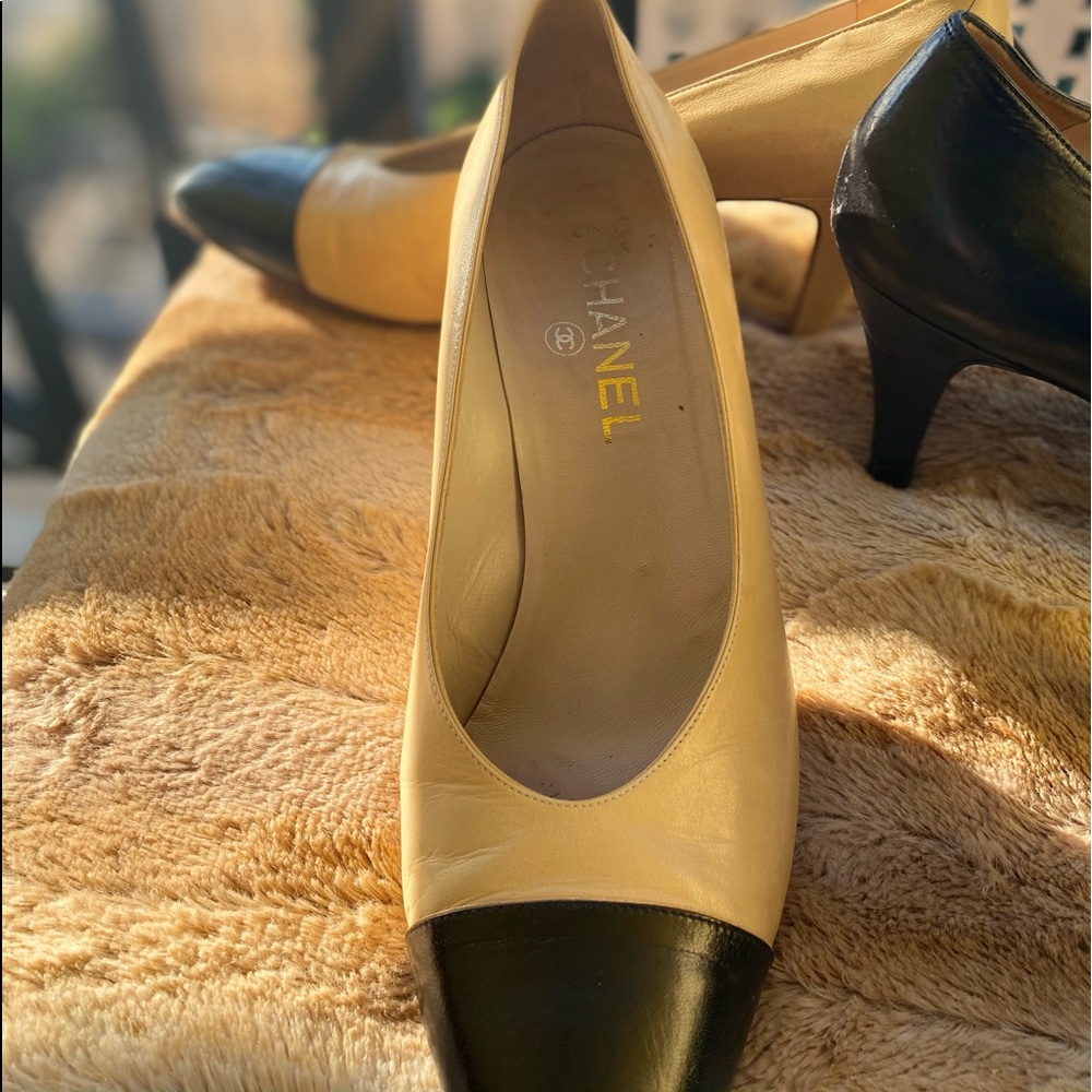 CHANEL cream and black toe heels